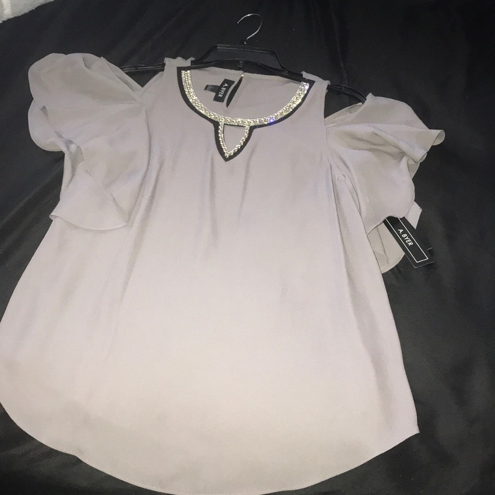 Professional yet sexy business blouse.